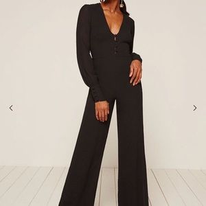 Brand new with tag and garment bag. Never worn.